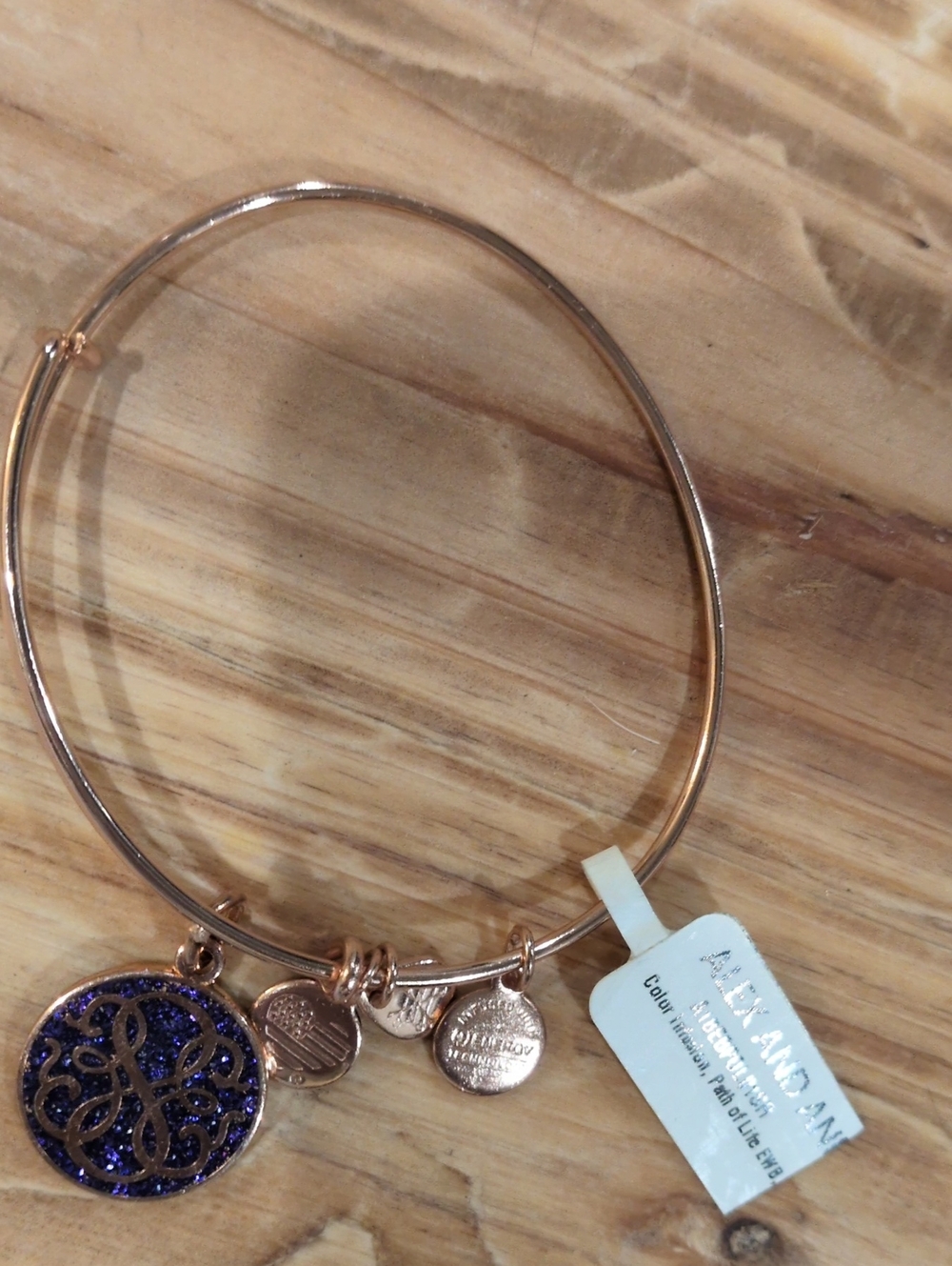 Alex and Ani Rose Gold Bracelet with Blue Sparkle Initial Charm